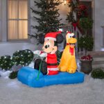 Gemmy Christmas Airblown Inflatable Inflatable Mickey Mouse and Pluto Sledding Scene, 4.5 ft Tall