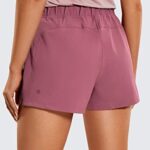 CRZ YOGA Women’s Waterproof Stretch Hiking Shorts: Mid Rise Summer Outdoor Golf Workout Shorts Zip Pockets with Belt – 3” Misty Merlot Small